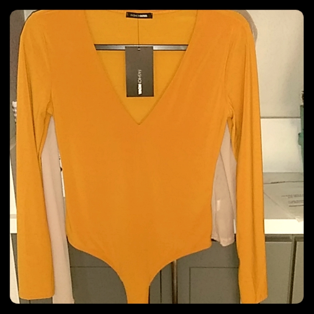 Long sleeved body suit